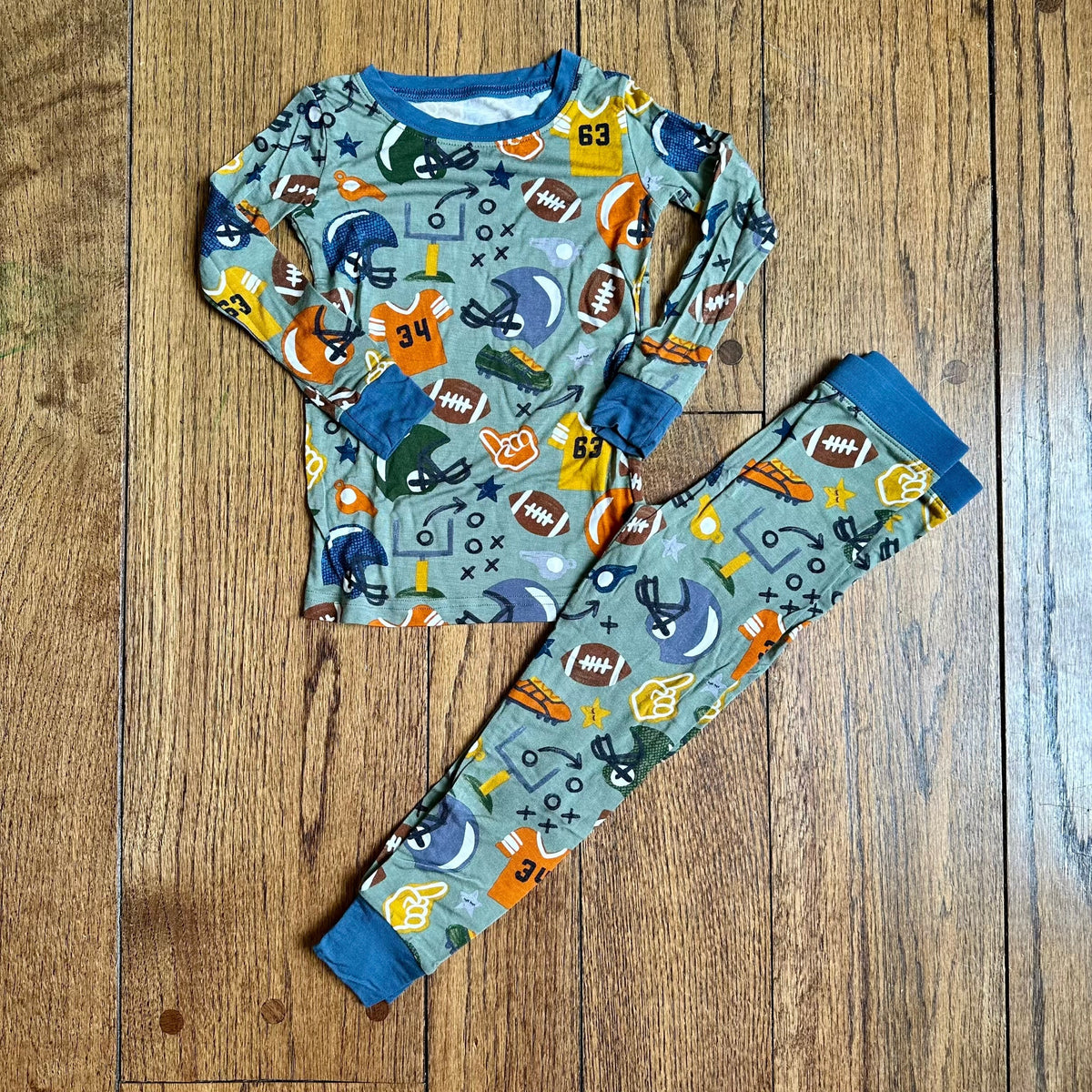#113	EEUC (not sure we wore these :) ) Little Sleepies Football 2T