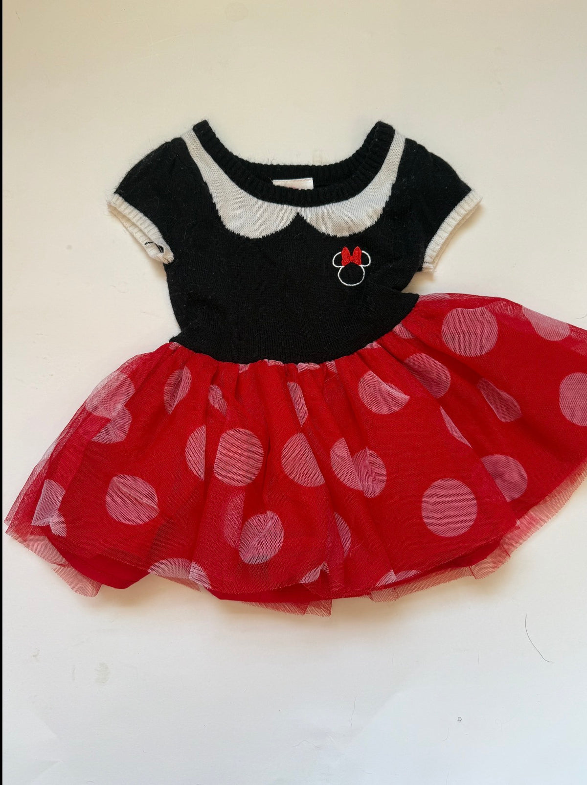 #170 Disney Minnie Mouse outfit, black sweater material top with tulle red polka dot skirted bottom. Girls 6-9 months