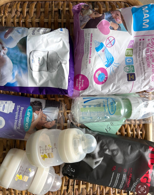 Seller #7 Assortment of baby bottles new
