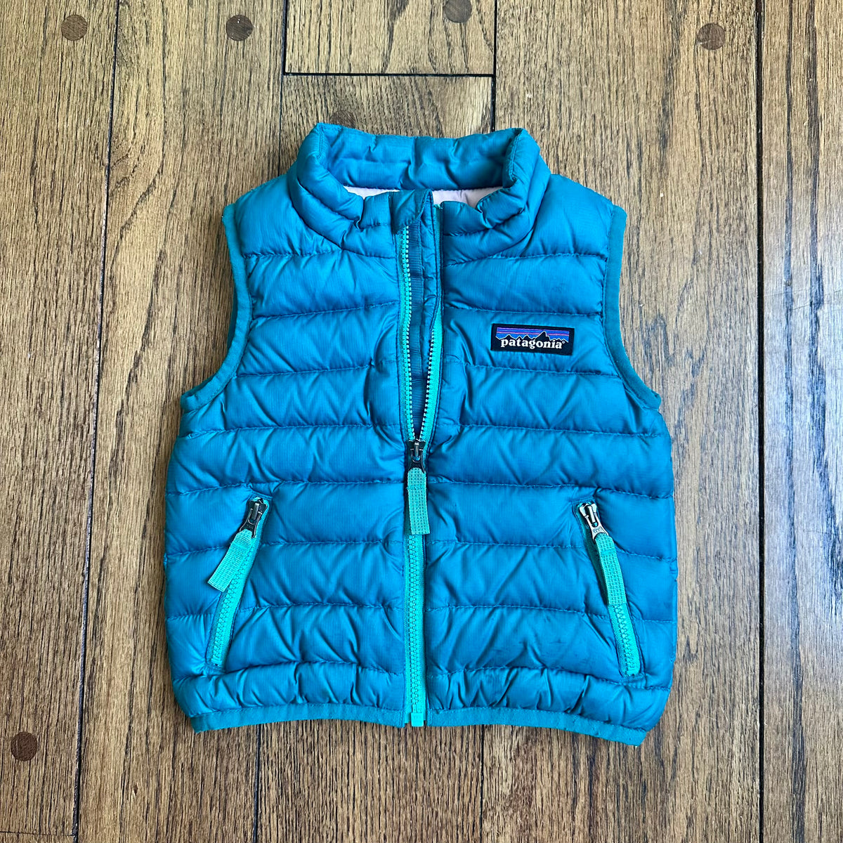 #113	GUC Boys Patagonia Teal Puffer vest, size 6-12 months