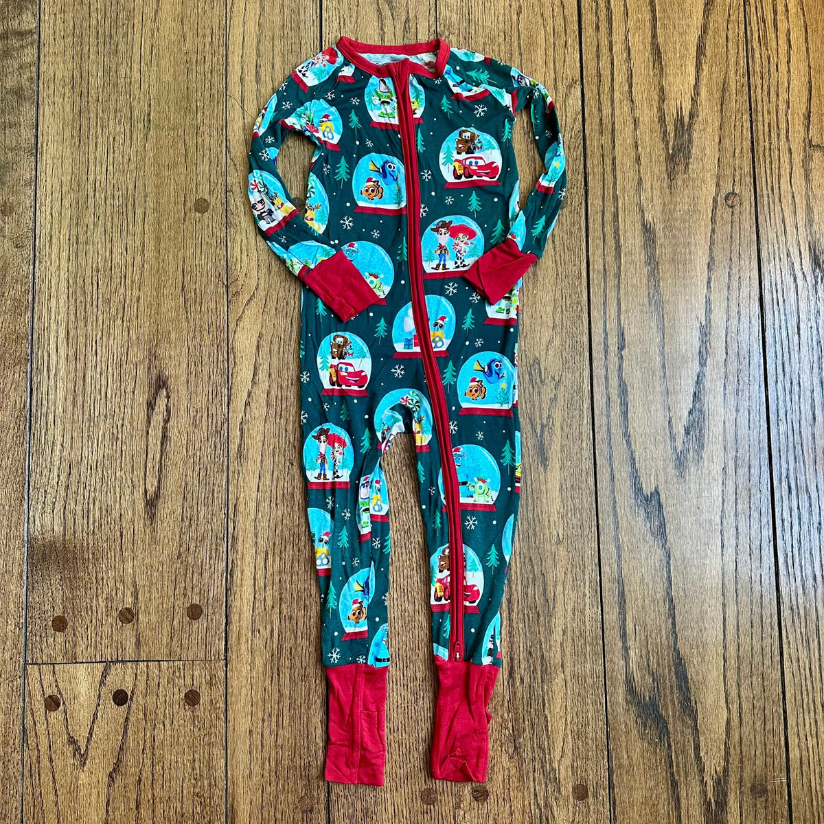 #113	EUC Little Sleepies Christmas Pixar Globes zippy, 18-24 mos
