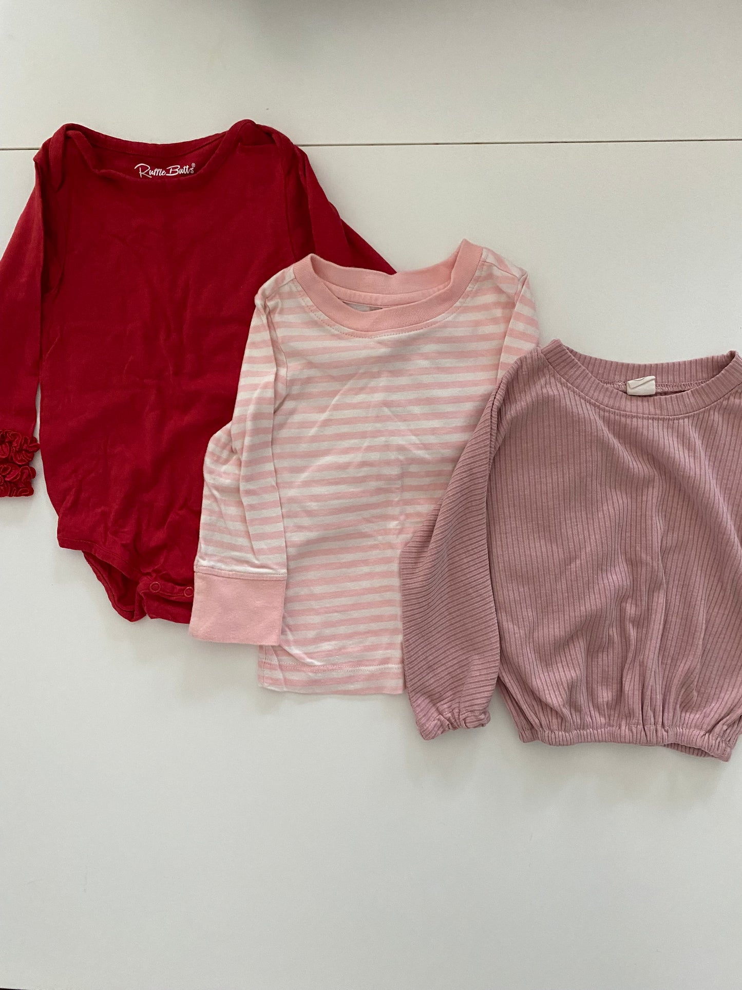 Hanna Andersson pink & white striped shirt and Ruffle Butts Red ruffle onesie and Amazon Blush Pink long-sleeved shirt bundle Girls 18-24M