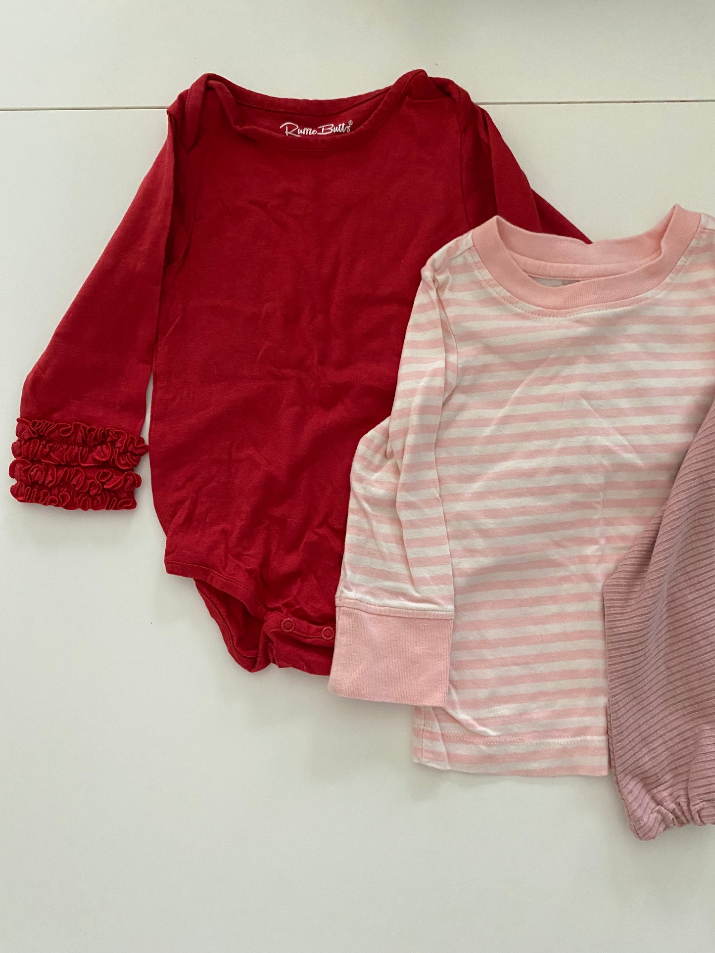 Hanna Andersson pink & white striped shirt and Ruffle Butts Red ruffle onesie and Amazon Blush Pink long-sleeved shirt bundle Girls 18-24M