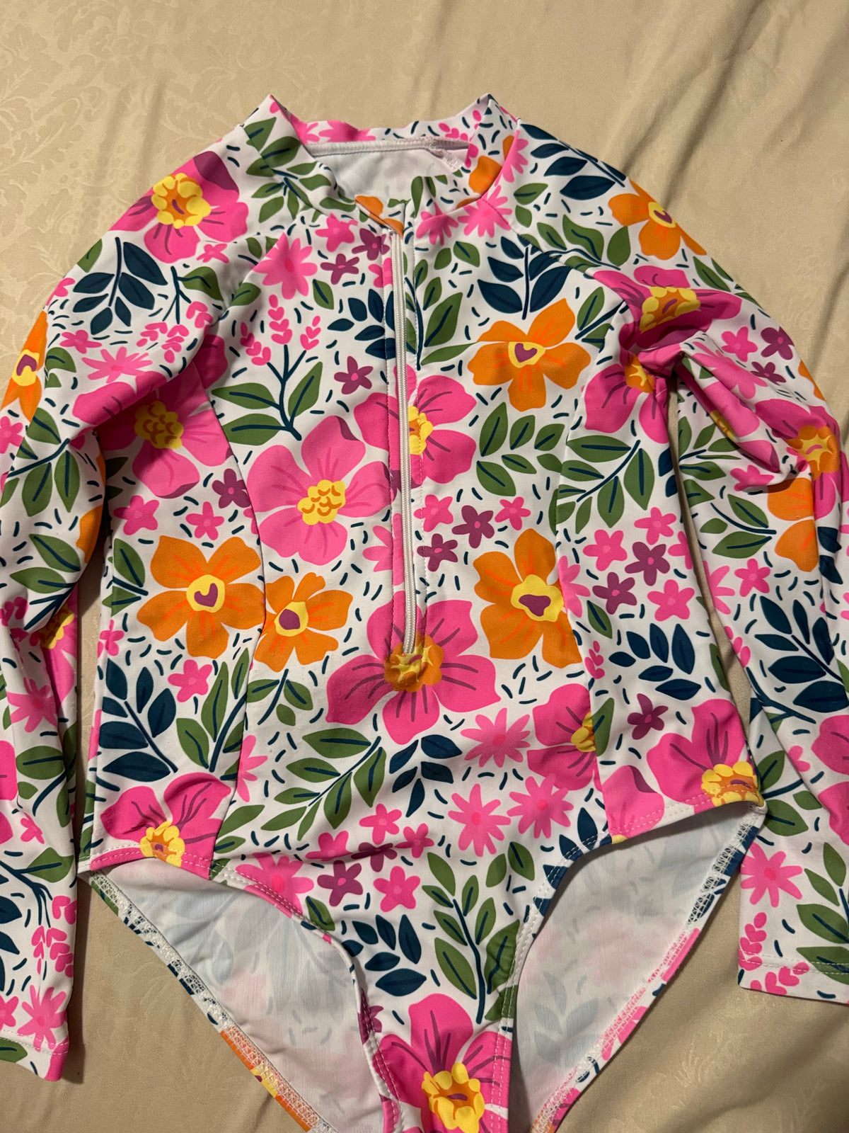 #55 girls bathing suit size10