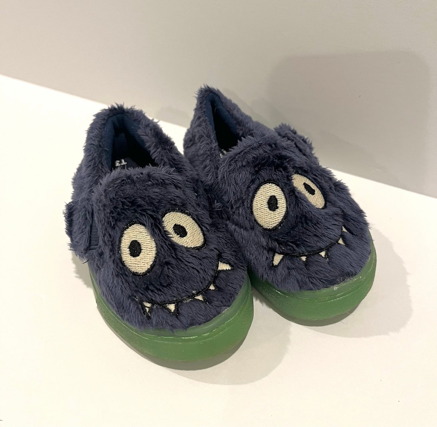 Seller #60 Toms baby slip on monsters Boys Size 3