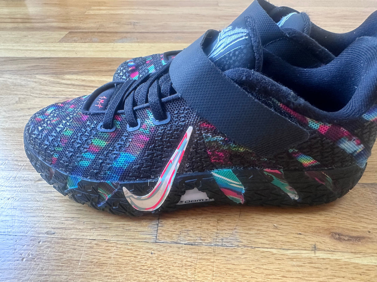 #104 Nike boy basketball shoe size 2.4