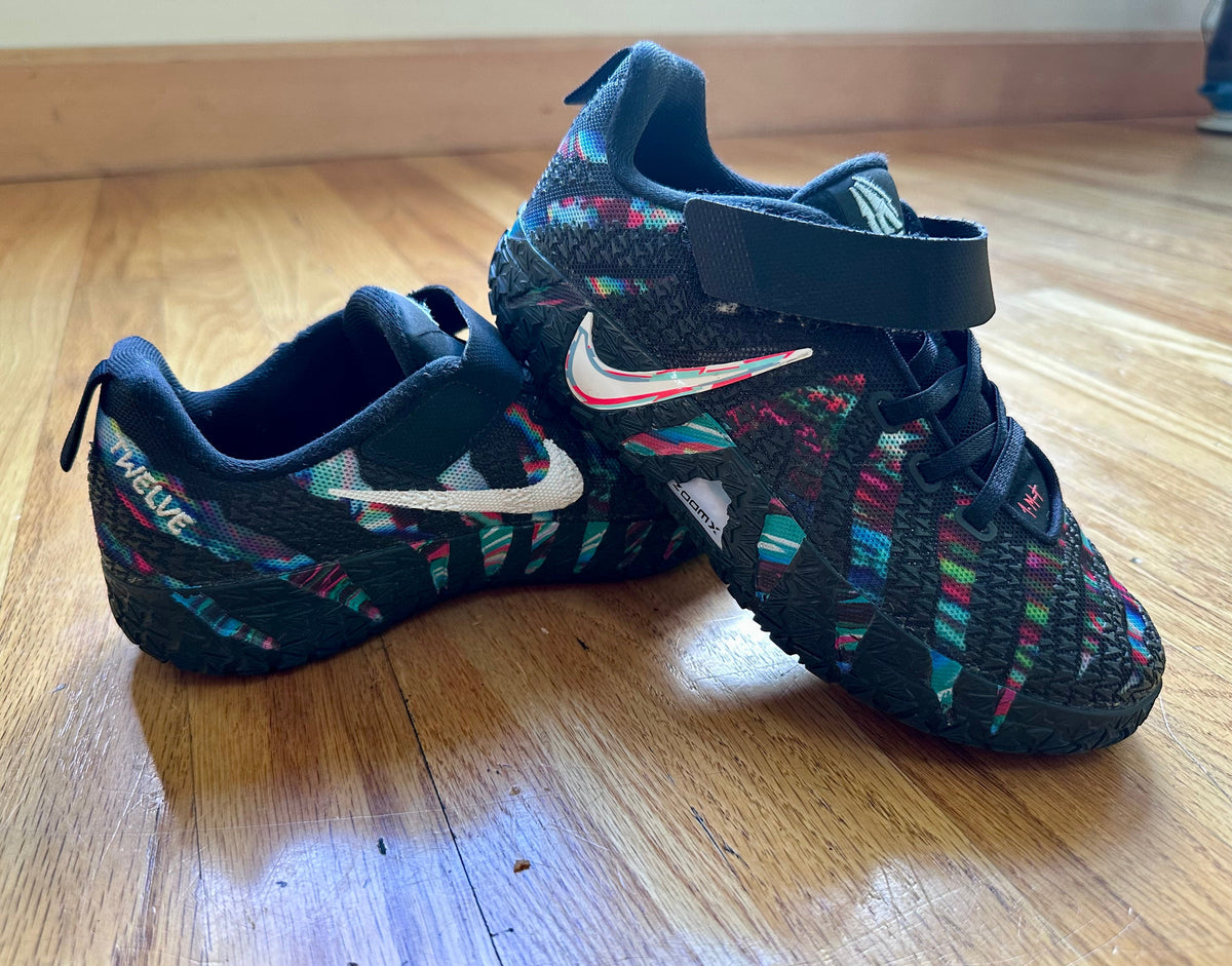 #104 Nike boy basketball shoe size 2.4
