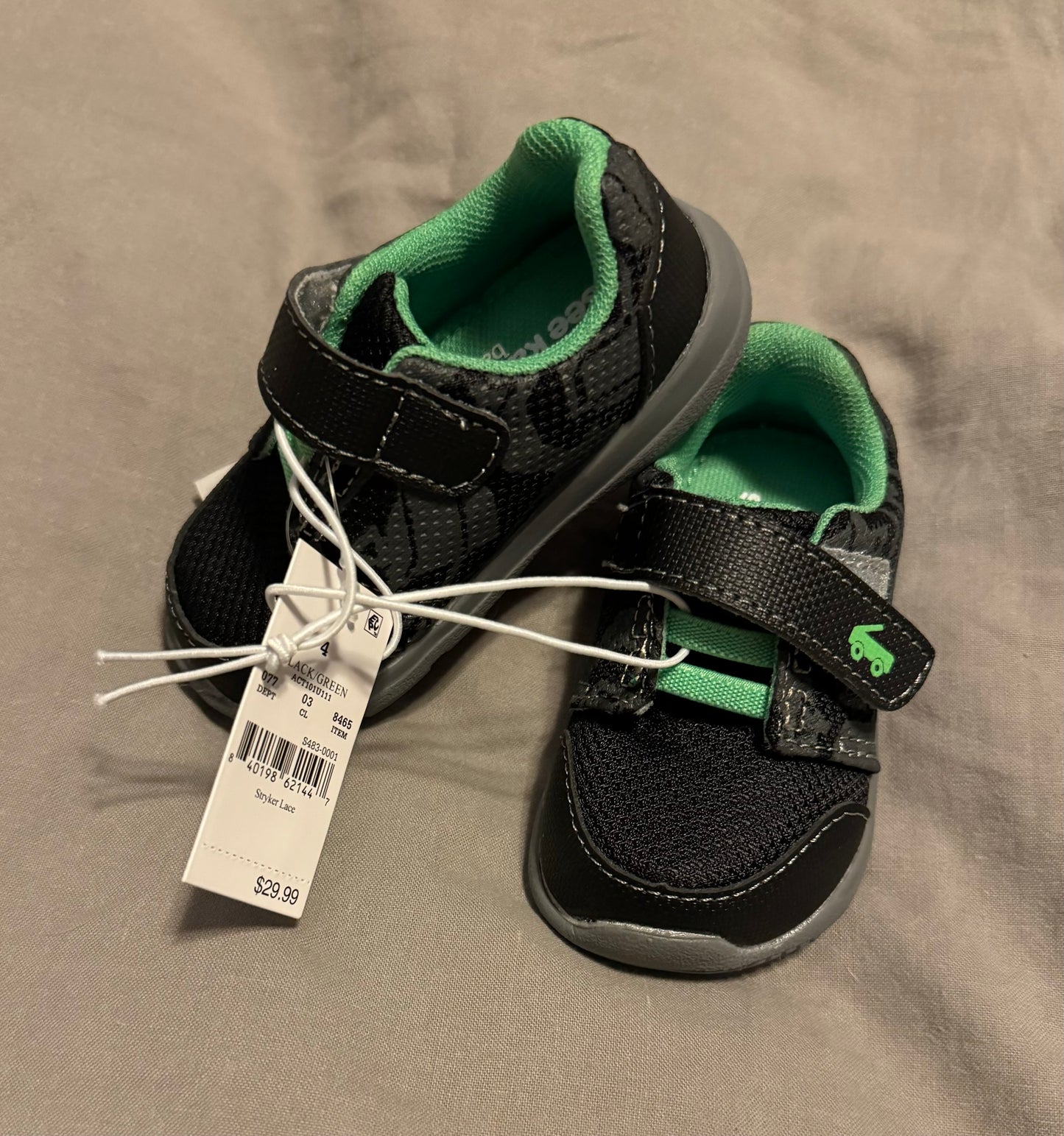 #86A boys size 4 see Kai run shoes. New with tag in box. Black and green