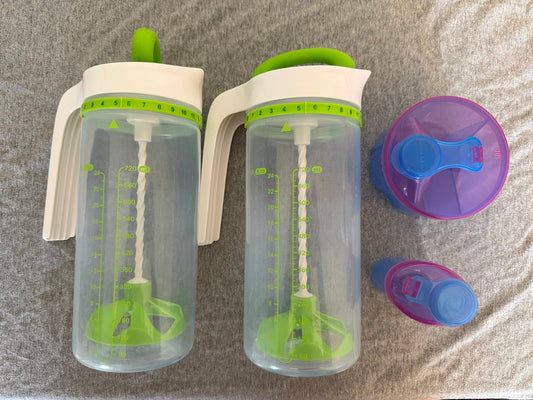 #173-Munchkin formula pitchers and travel formula containers