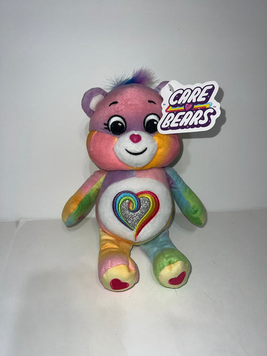 #78 NWT rainbow heart care bear