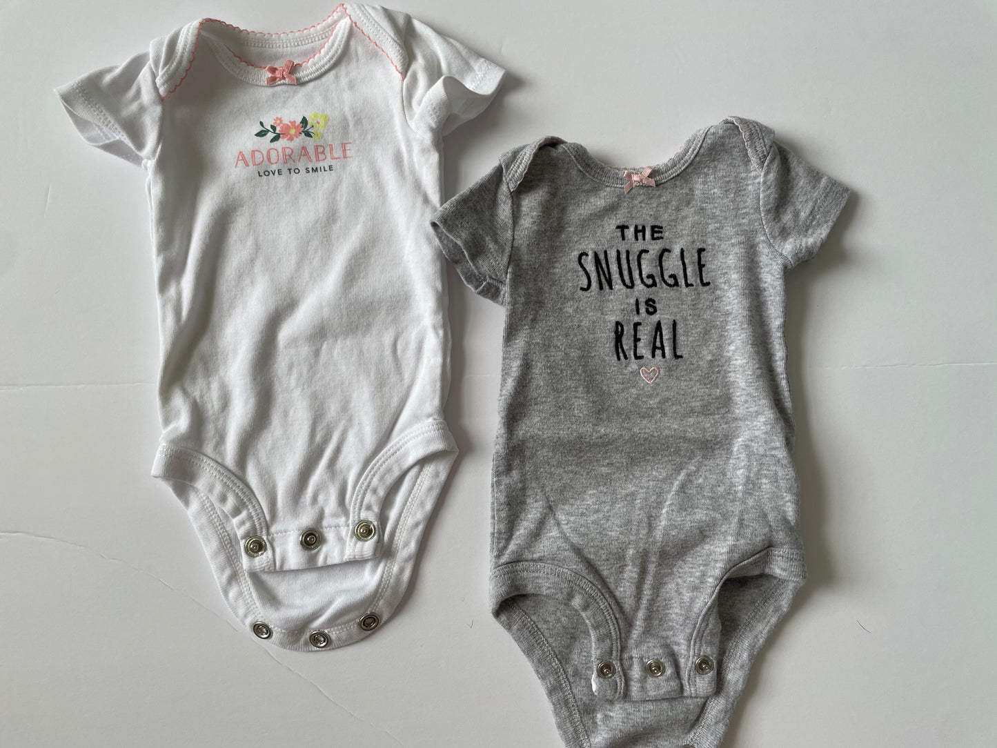 #3 Carters onesies w/ bow 2-pack Girl size NB
