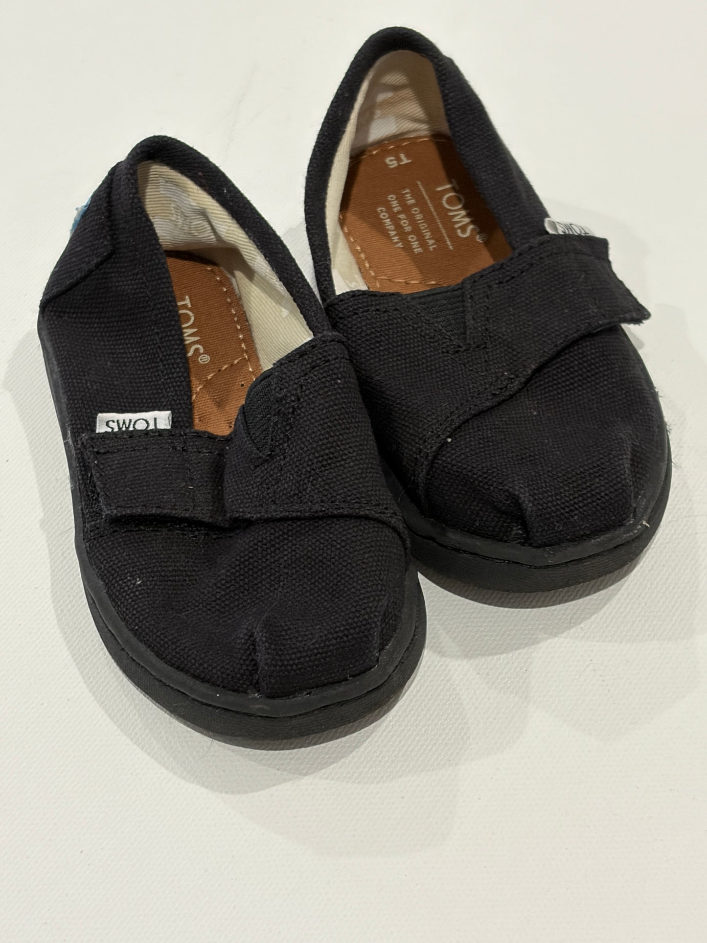 #103 Black Toms Size 5