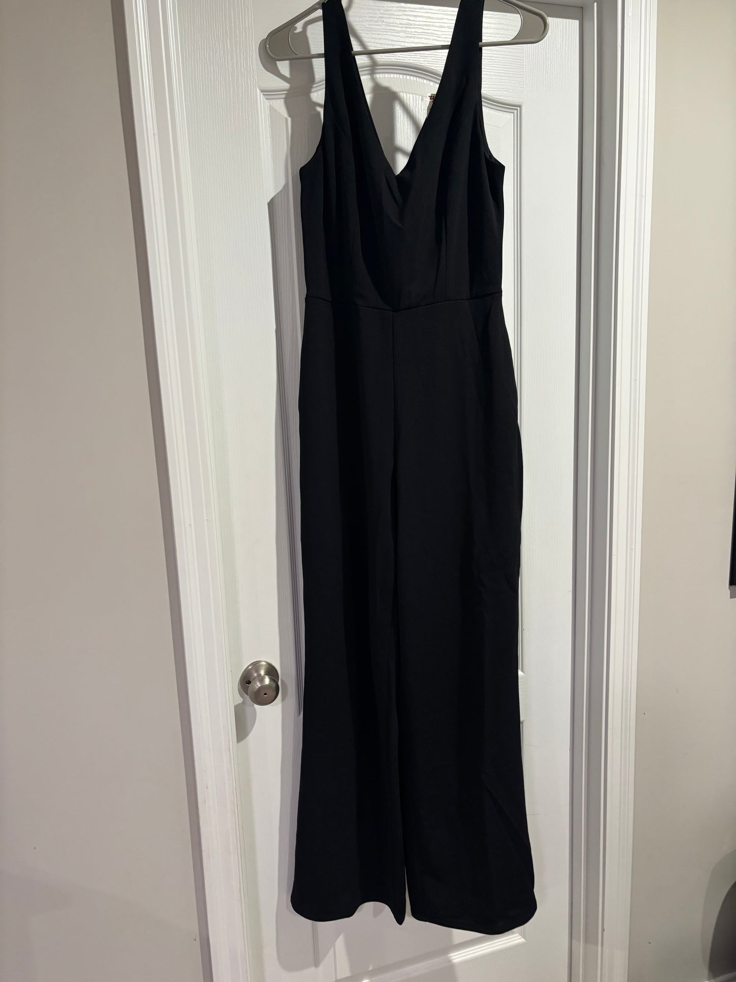 Seller #2 NWT women’s black jumpsuit size M