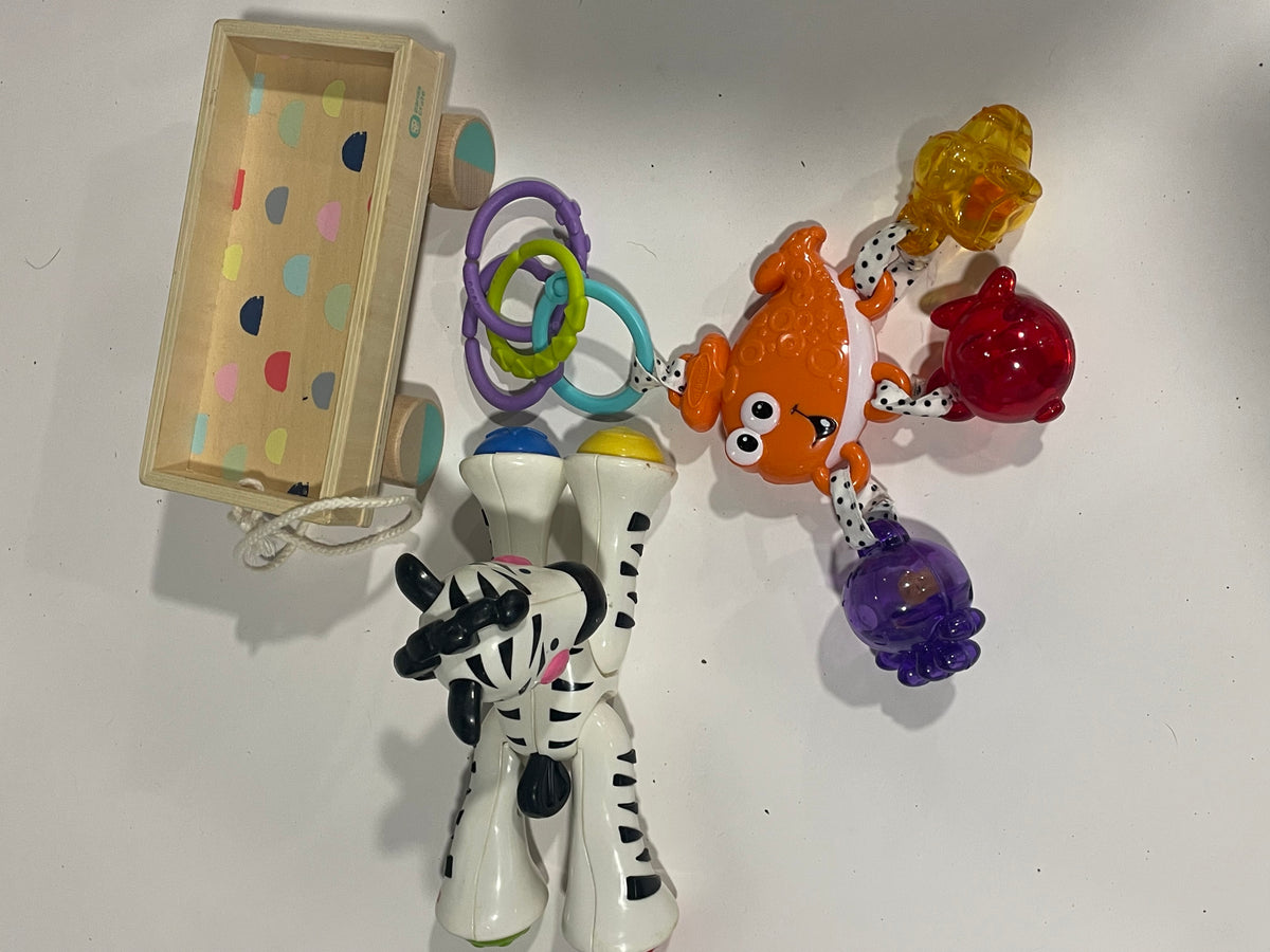 #83 Plastic Toys and pull wagon