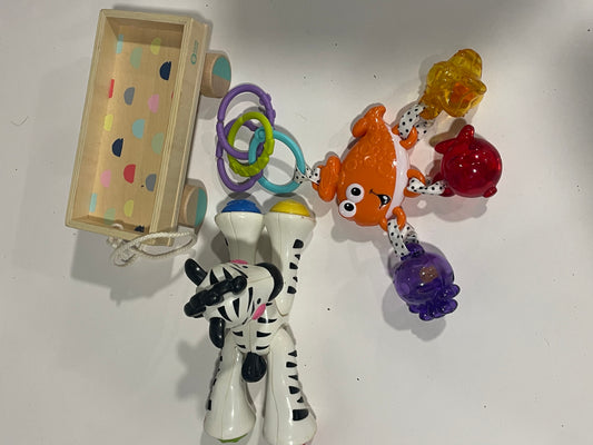 #83 Plastic Toys and pull wagon