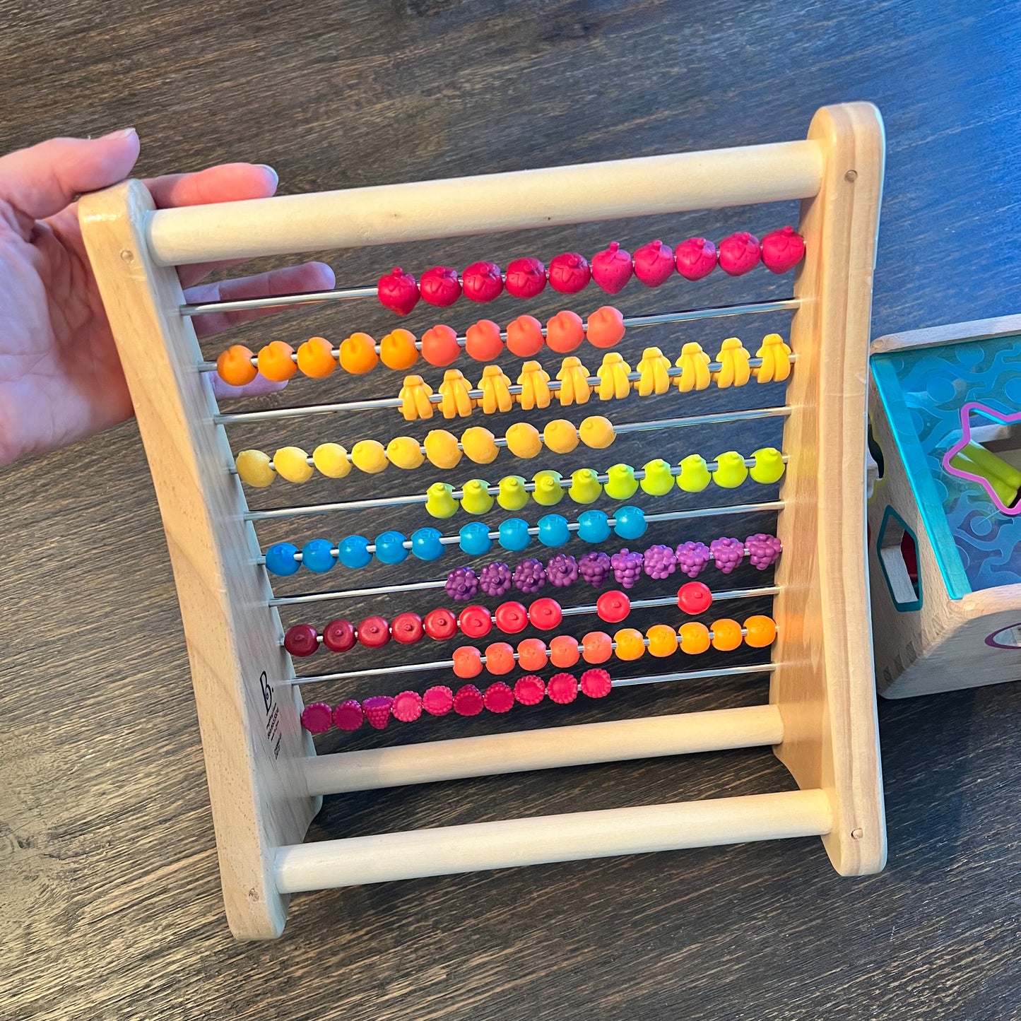 #5 B. toys Two-Ty Fruity Wooden Abacus and Wooden Cube Shape Sorter.  view pictures and descripion