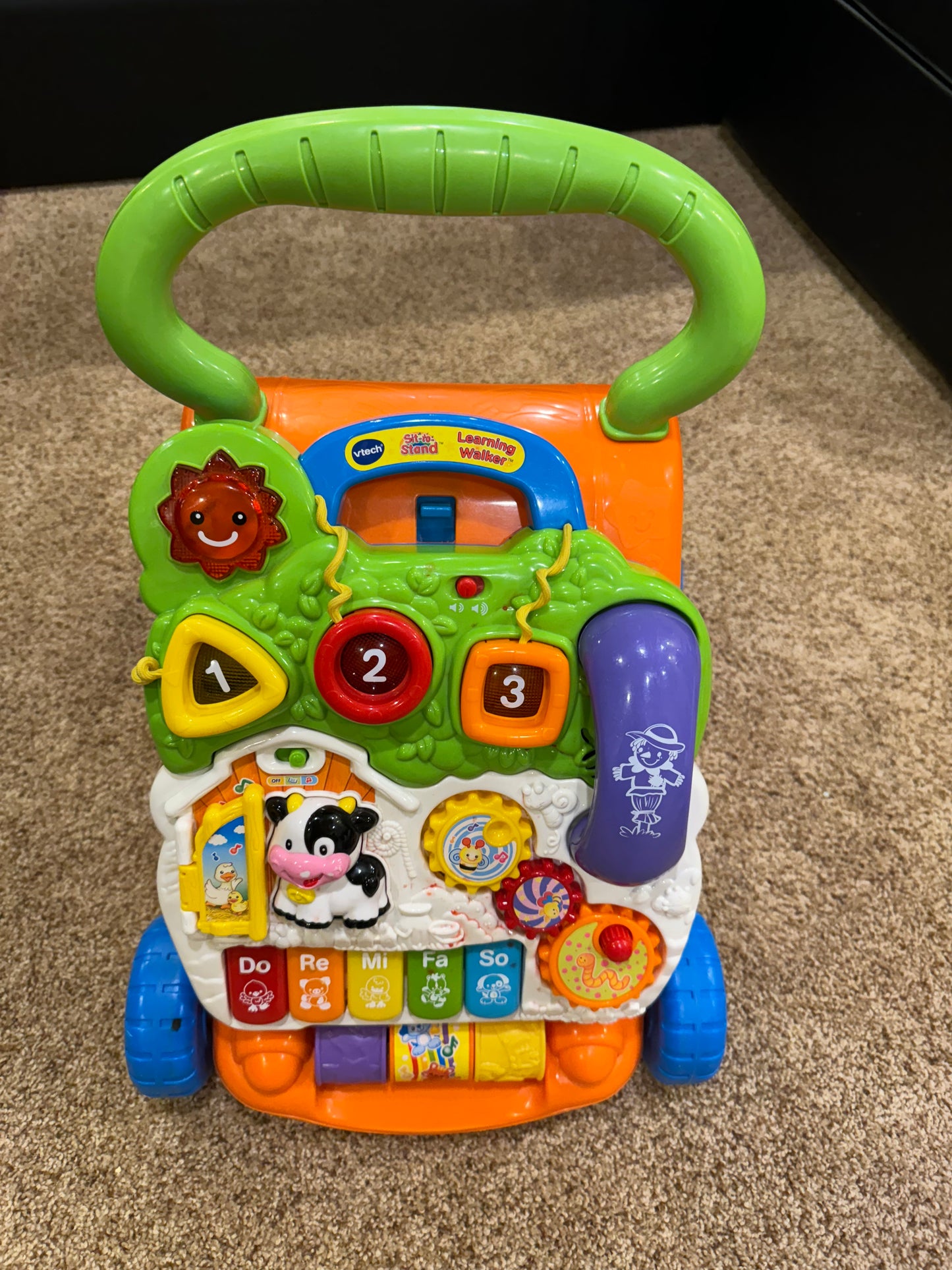 #86A Vtech sit to stand learning walker, front face removable