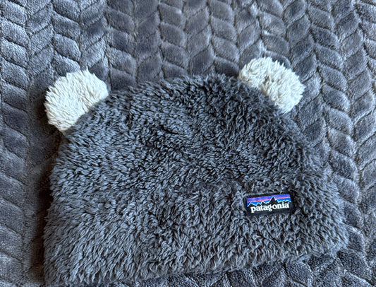 #74- Patagonia hat 3-6 mo