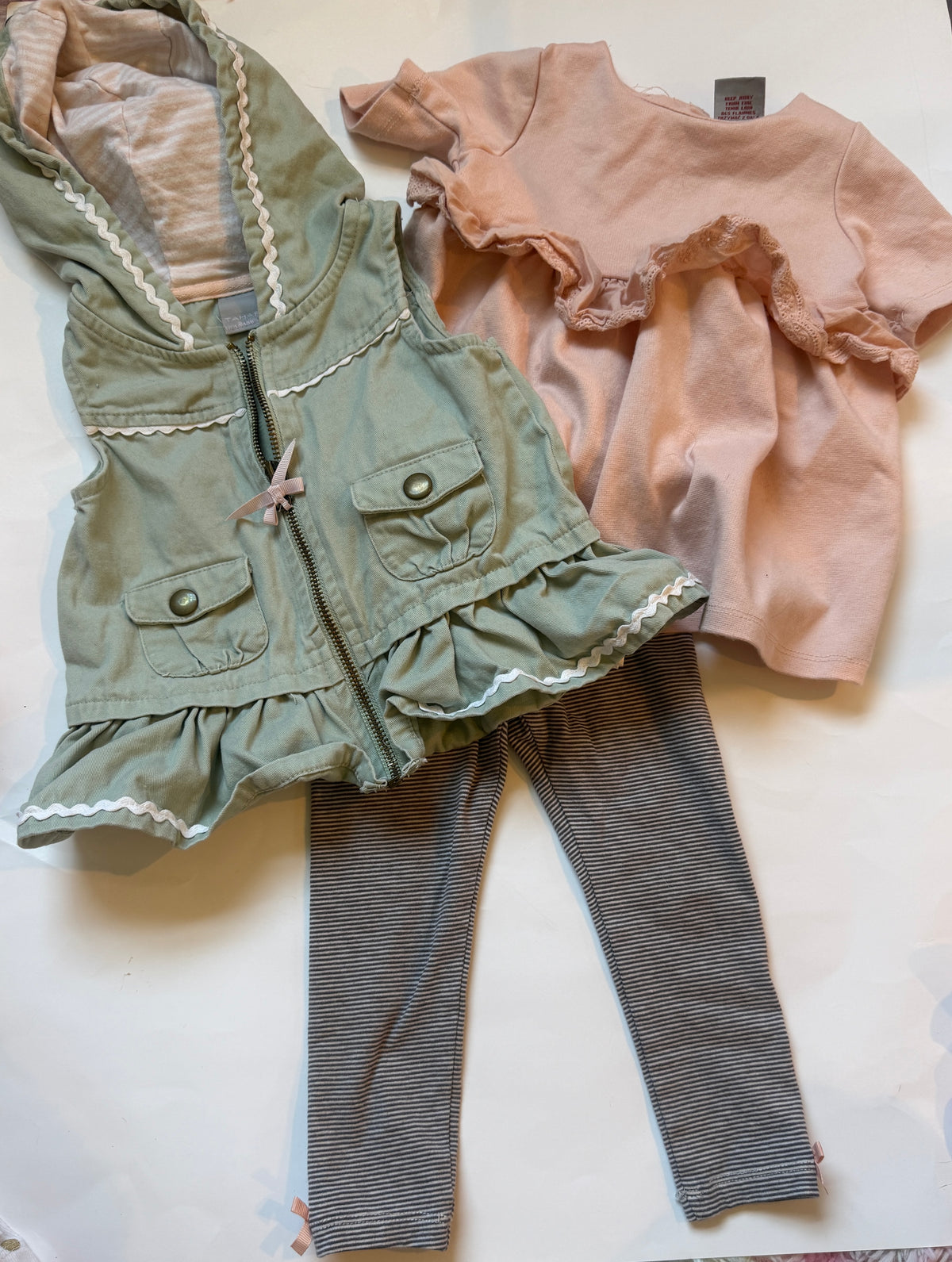 #170 Tahari 3 Piece Set— Army Green Zip up hooded ruffled vest, pink ruffled shirt and striped pants with matching bow girls 18 months