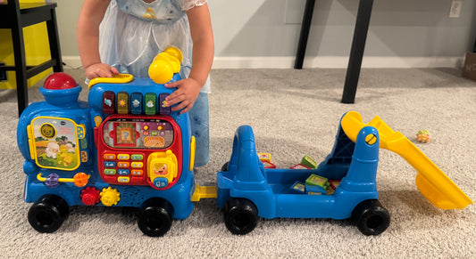 #187 VTech Sit to Stand Alphabet Riding Train