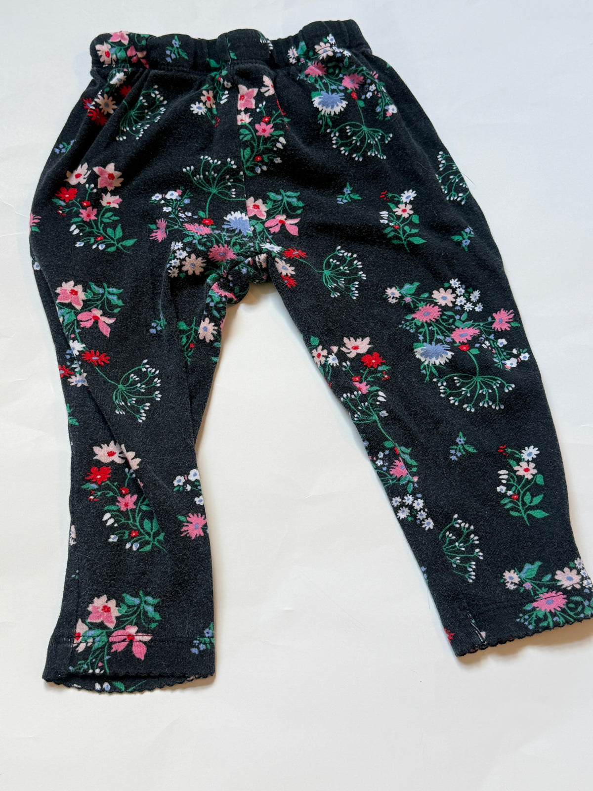 #170 Carters pants bundle (3)—Denim color leggings, white with pastel flowers, black with flowers girls 18 months