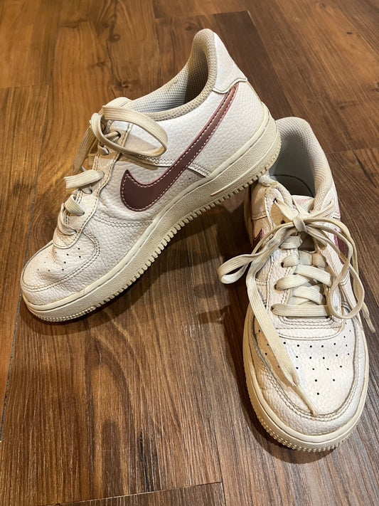 #67 White and Pink Nikes 4Y