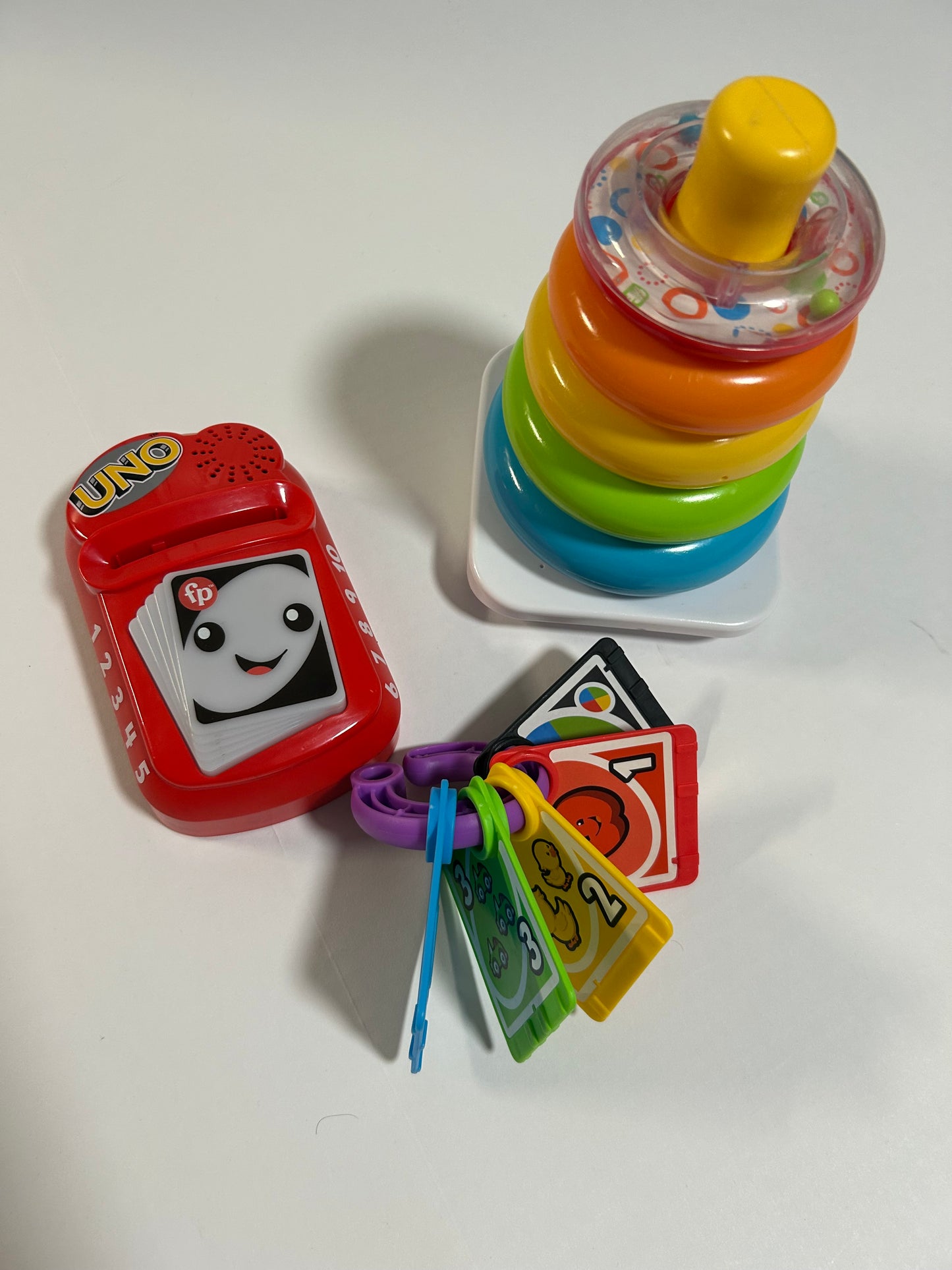 #27 Fisher Price Uno Game + Stacking Rings