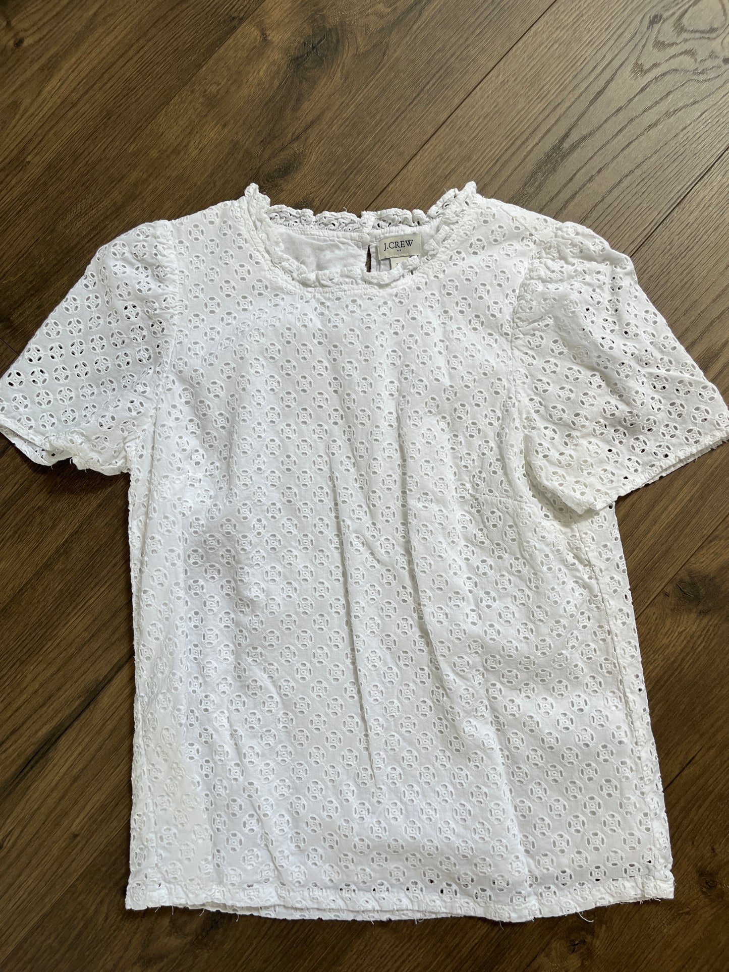 137 ( 2 shirts)Ann Taylor loft Eyelet navy blue sleeveless top and Jcrew cap sleeve eyelet top both LN and XS