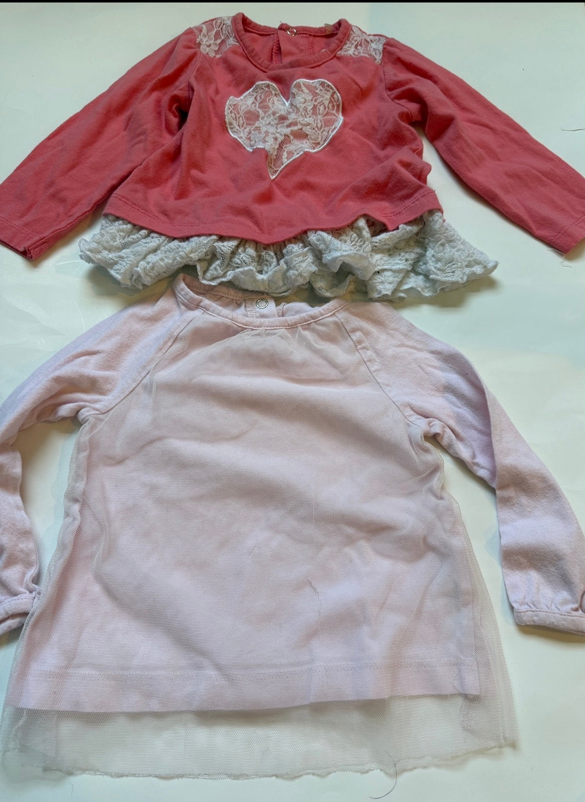 #170 Shirt bundle— carters light pink with tulle long sleeve shirt and baby gear long sleeve shirt with lace heart and lace around bottom. Girls 18 months