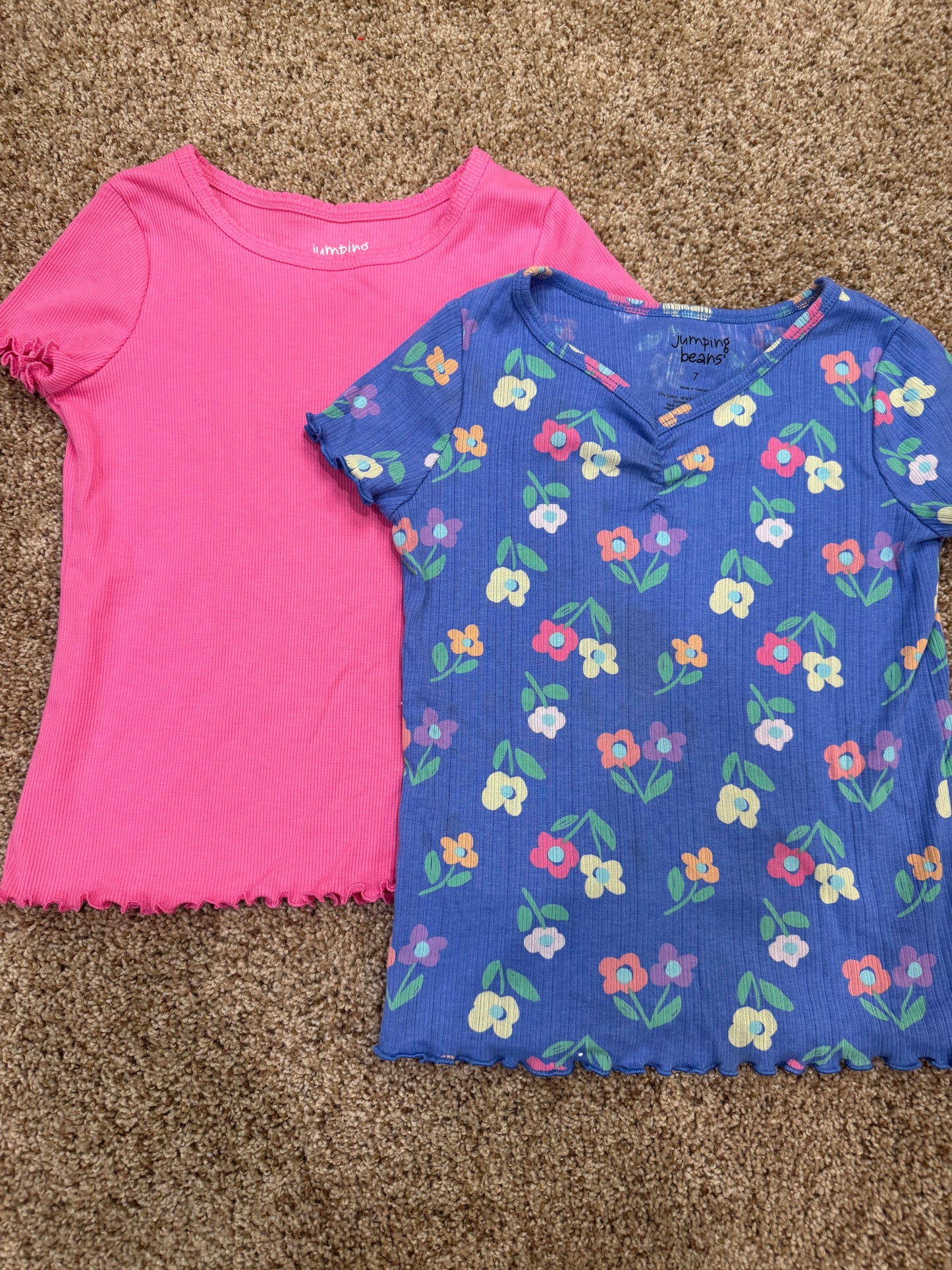 #73 girls size 7 jumping bean shirts , pink and purple with flowers