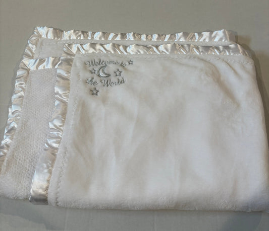 #25 White baby blanket that says “welcome to the world”