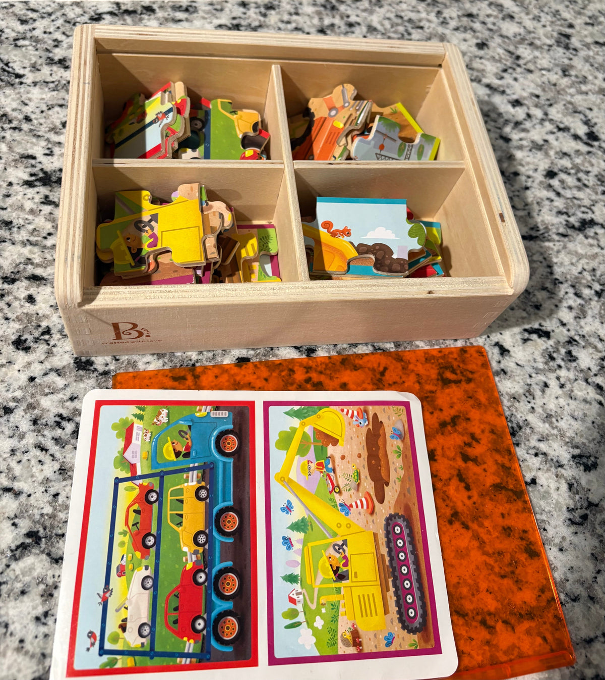 #25 Set of 4 puzzles in box with lid B Toys