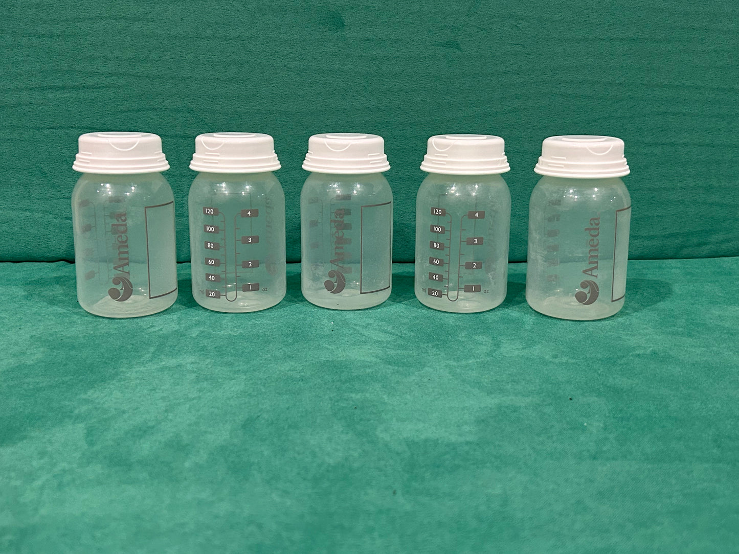 Seller 128 - Ameda 4 ounce Collection Bottles Set of 5