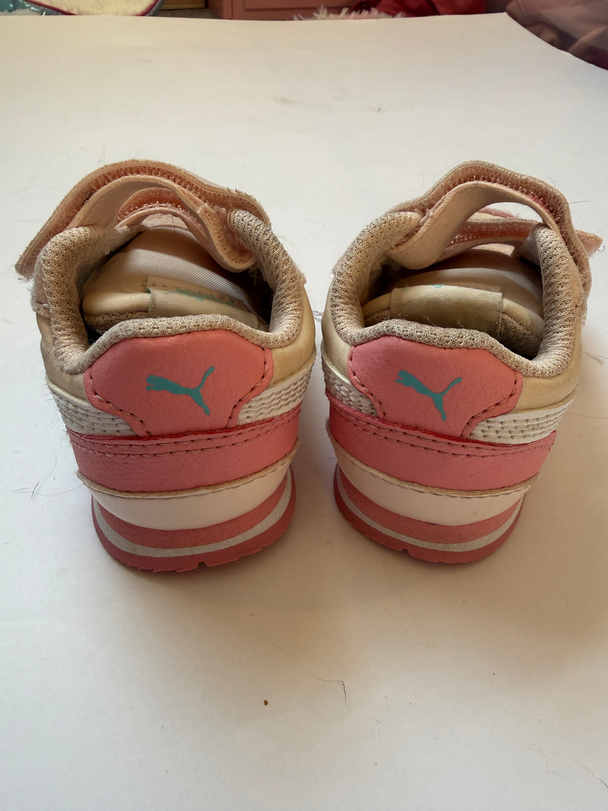 #170 Puma peach and pink tennis shoes girls 5C