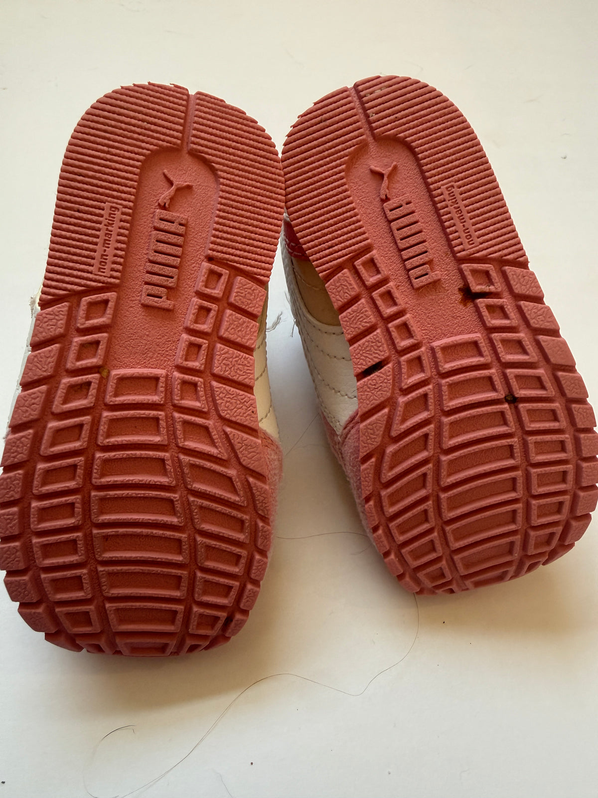 #170 Puma peach and pink tennis shoes girls 5C