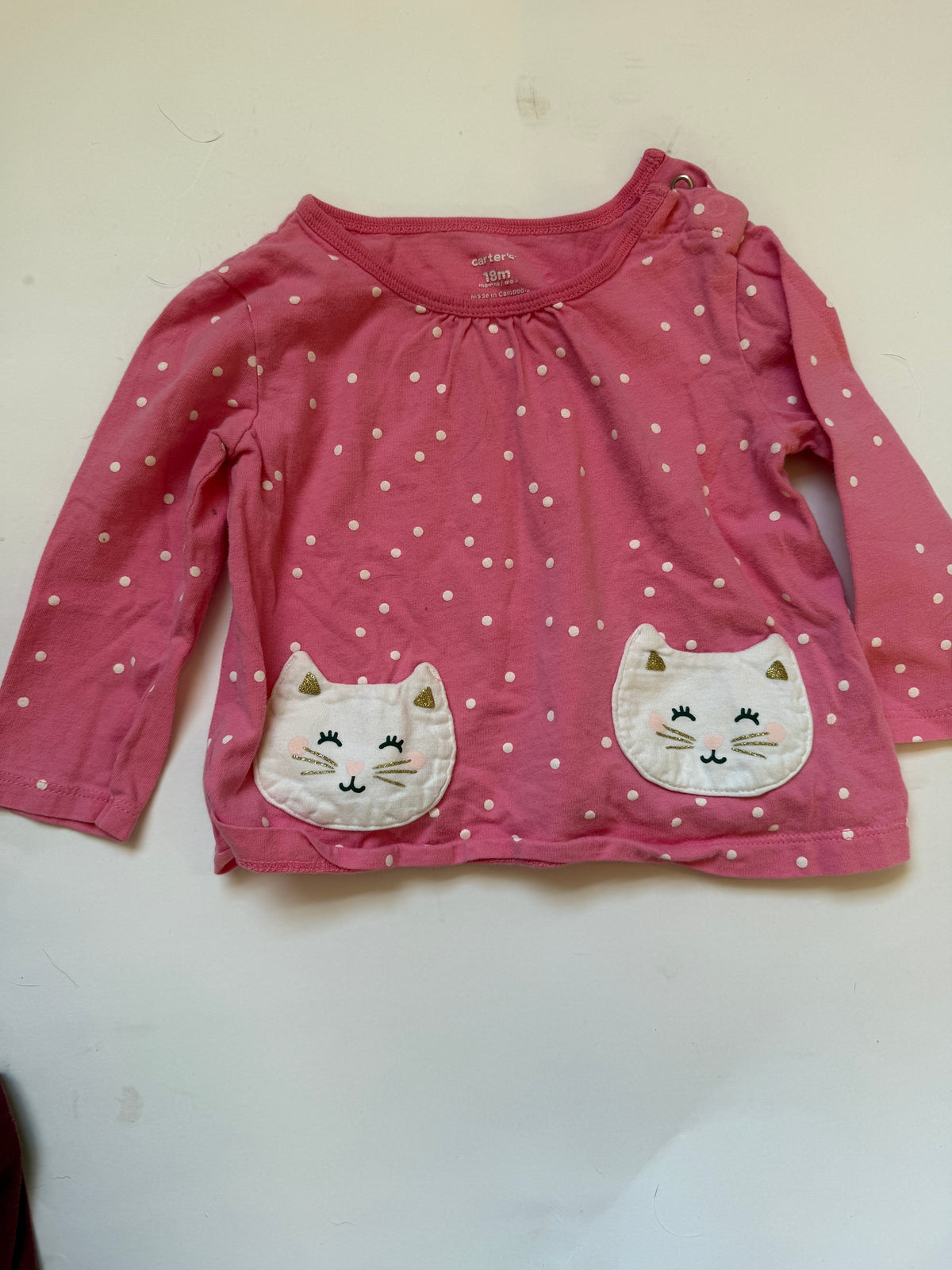 #170 Carters tops bundle (3)—pink with white polka dots and white little pockets, burgundy top with ruffle neck and fleece printed vest girls 18 months