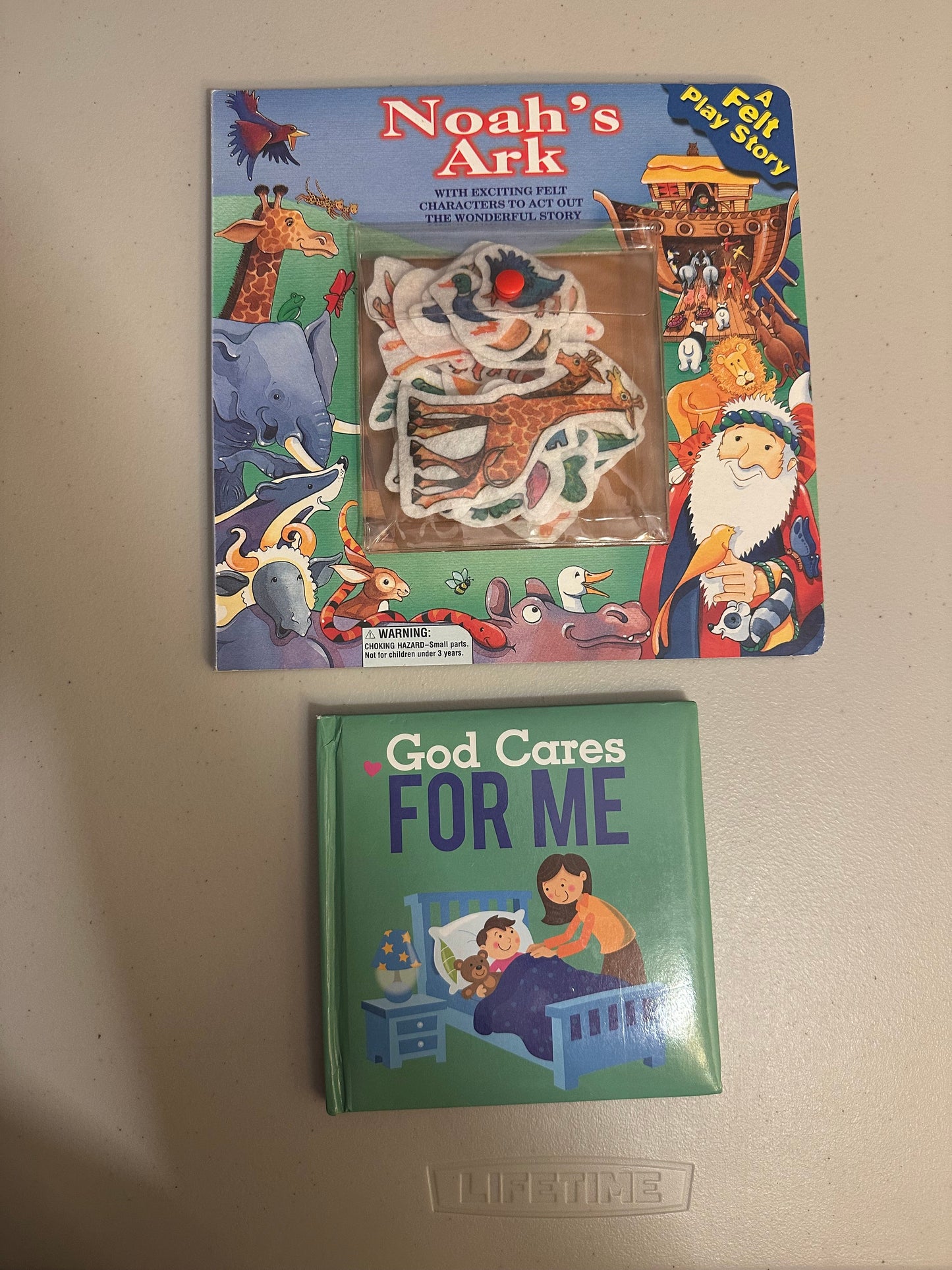 #85 REDUCED Pair Christian Books- Noah’s Ark Felt Play and God Cares for Me