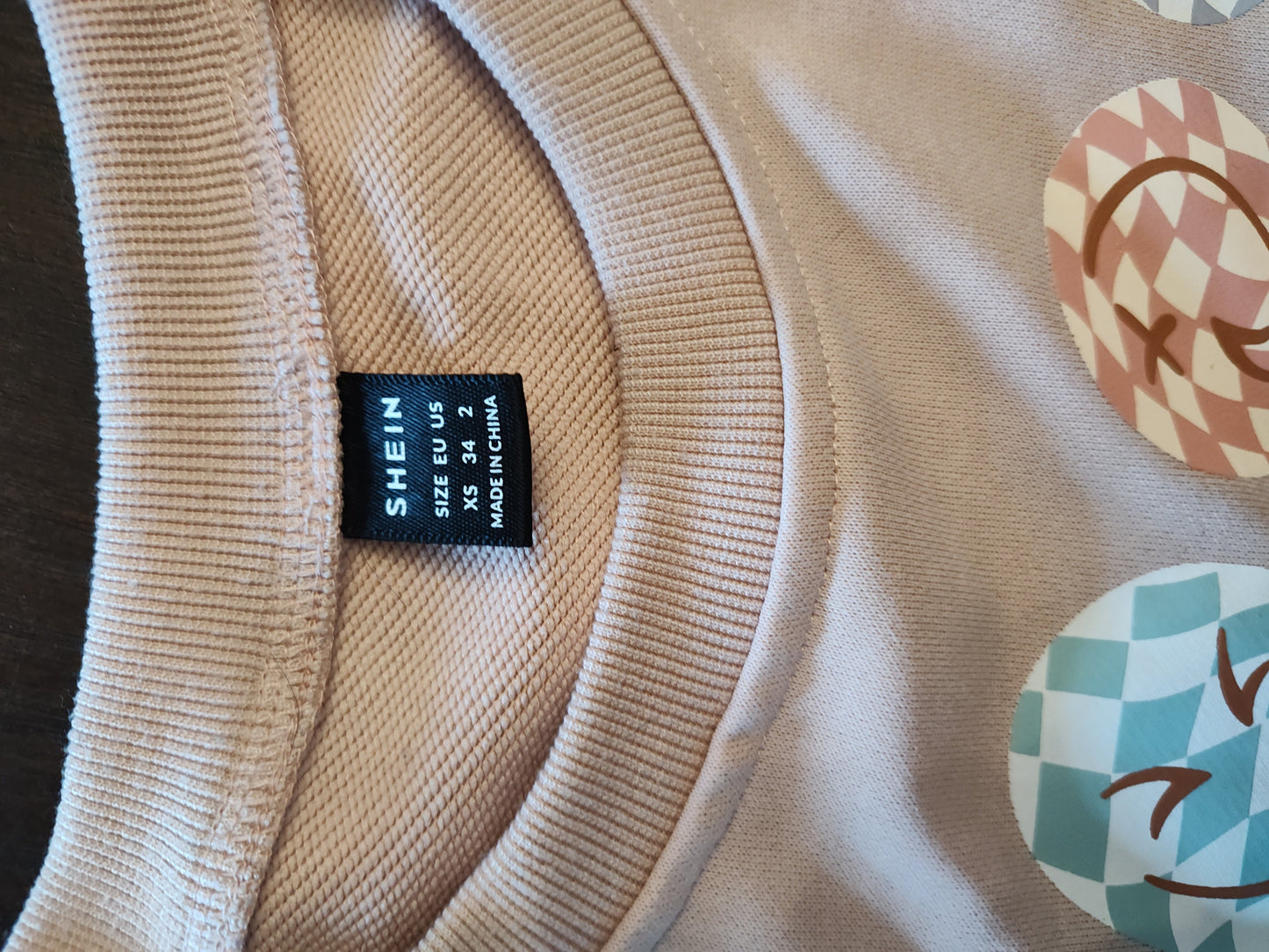 Seller 185:  Shein Women's XS Oversized Smile sweater (also fits girls size 14/16)