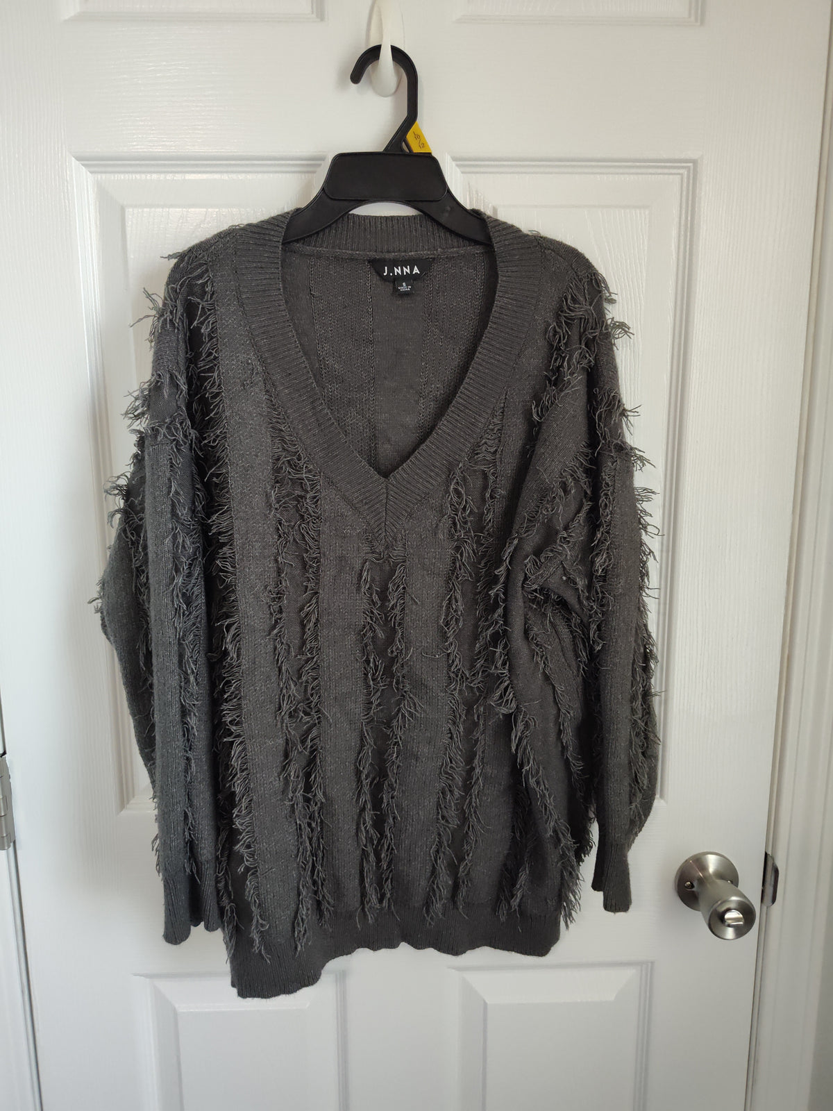 Seller 189:  J.NNA fringed charcoal sweater women size small