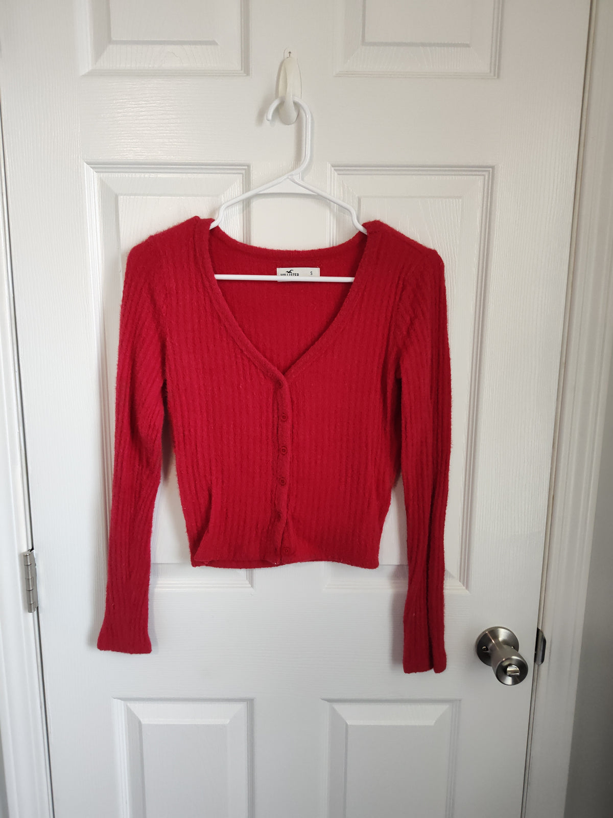 Seller 189:  Hollister women's sz small red cardigan sweater