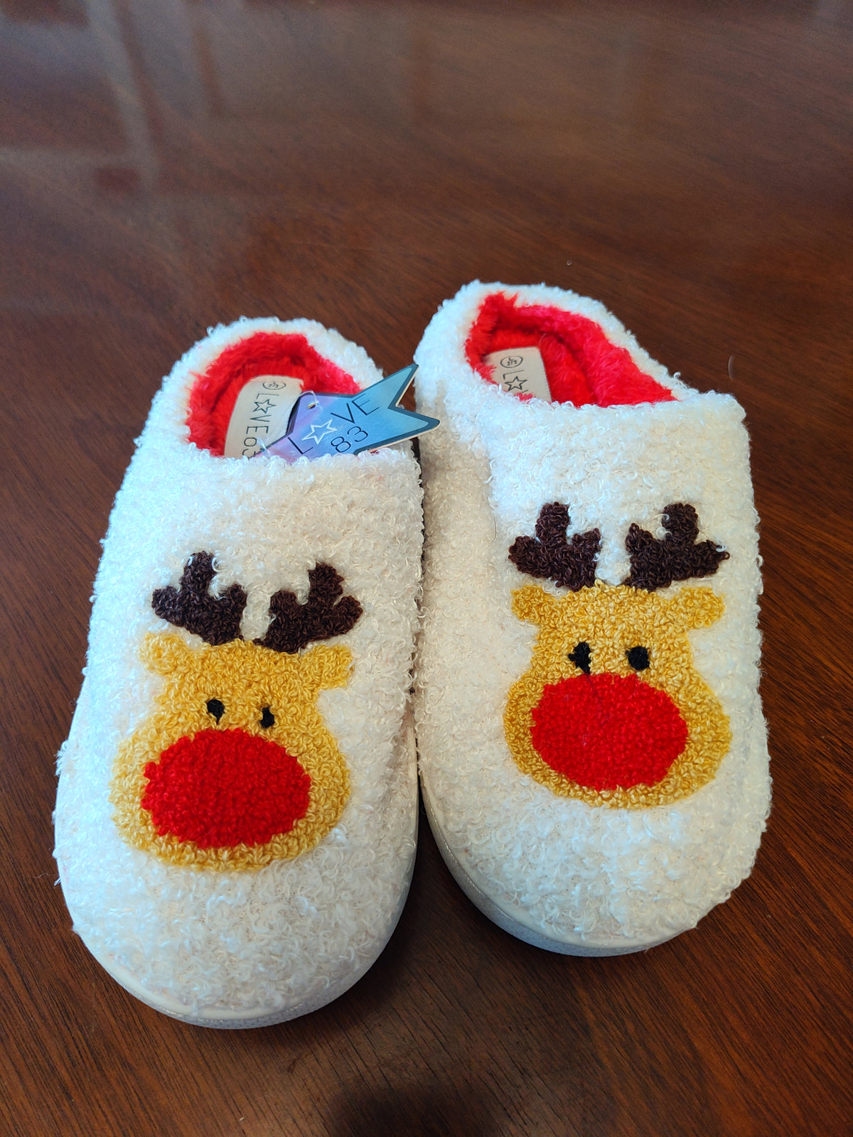 Seller 189:  New Reindeer Slippers size 2/3 youth