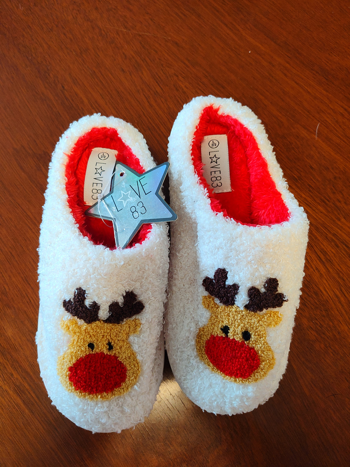 Seller 189:  New Reindeer Slippers size 2/3 youth