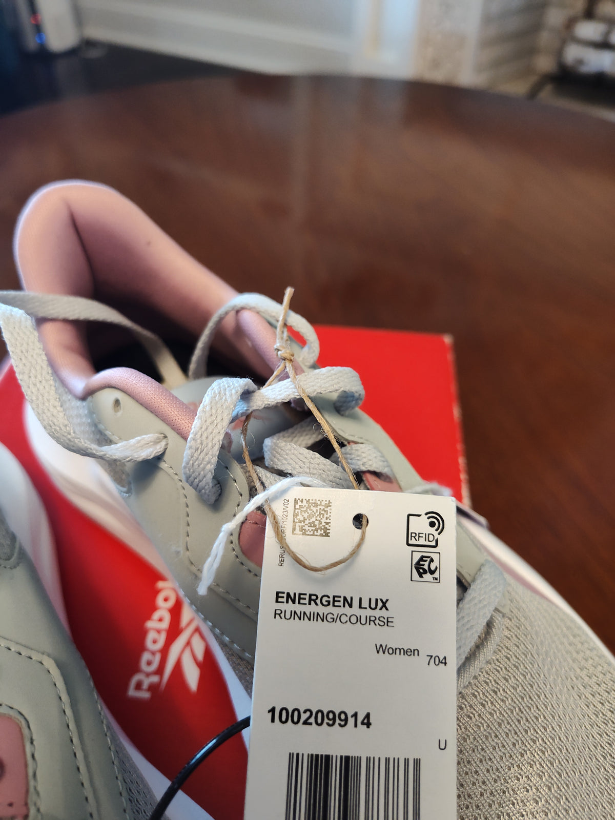 Seller 189:  Reebok Women's Running Shoes Size 7 (Grey with pink accents)