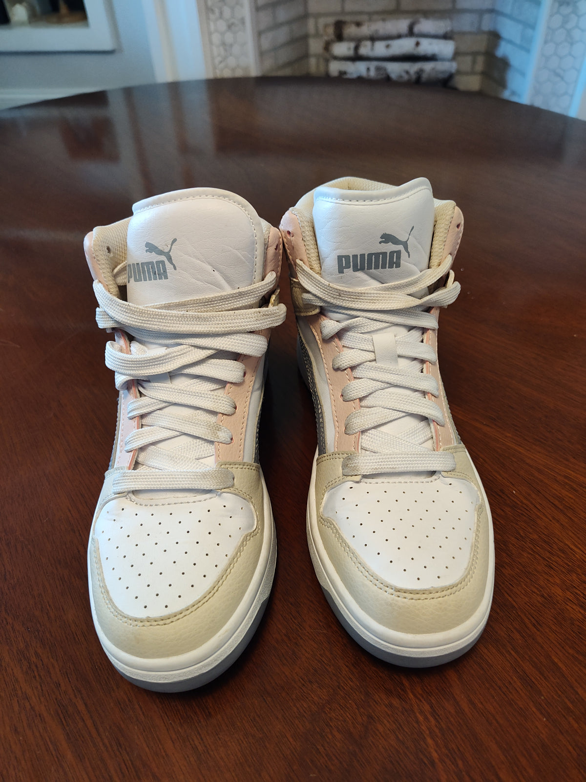Seller 189:  Puma white/pink/grey high tops women's size 7.5