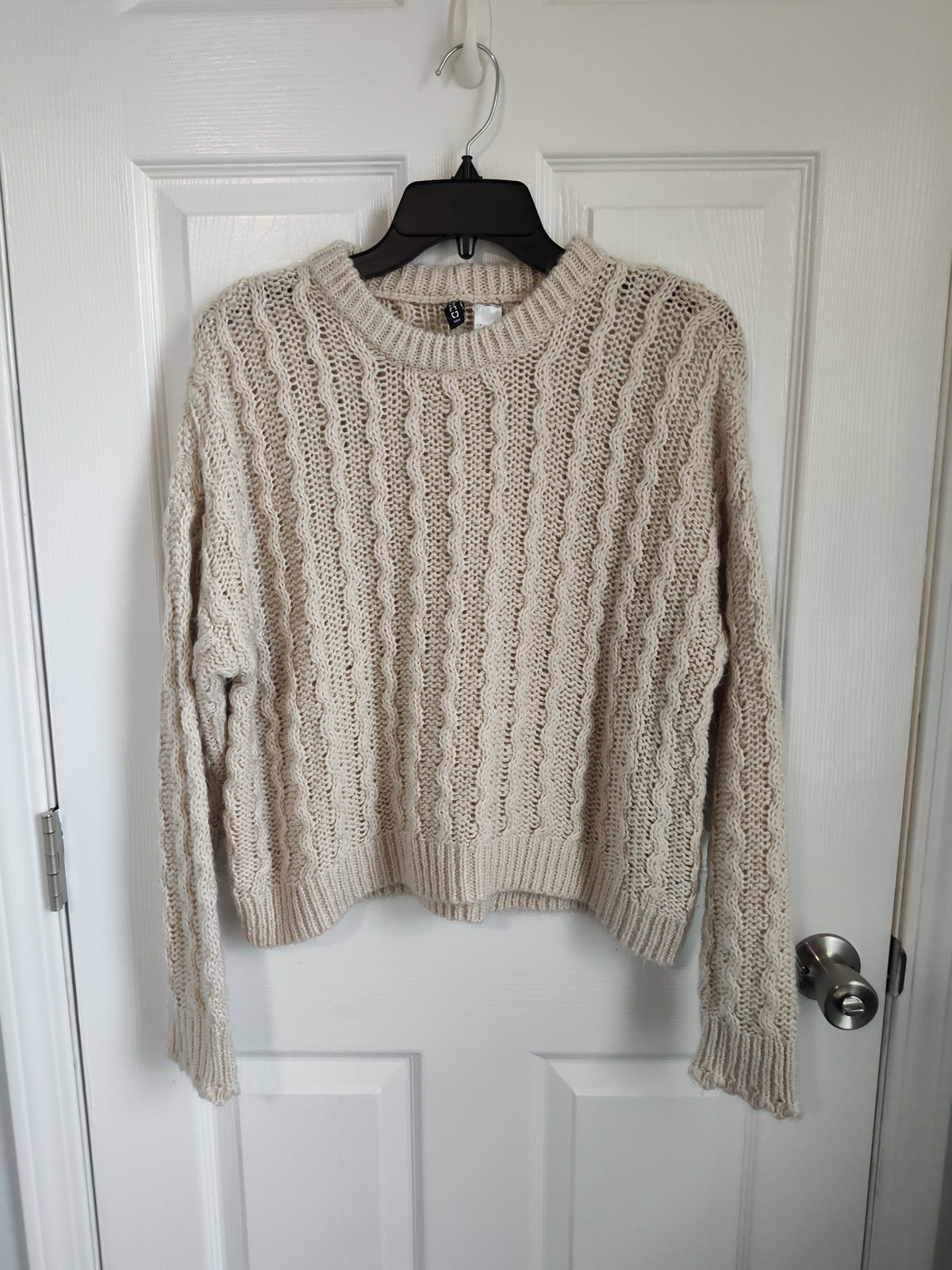 Seller 189:  Divided beige sweater women's size medium