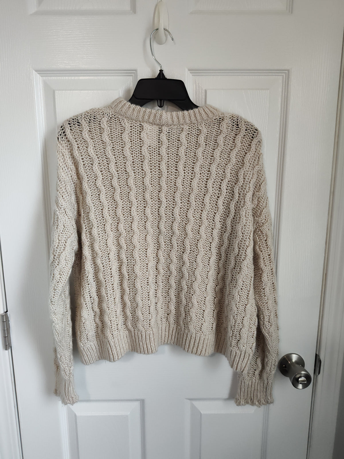 Seller 189:  Divided beige sweater women's size medium