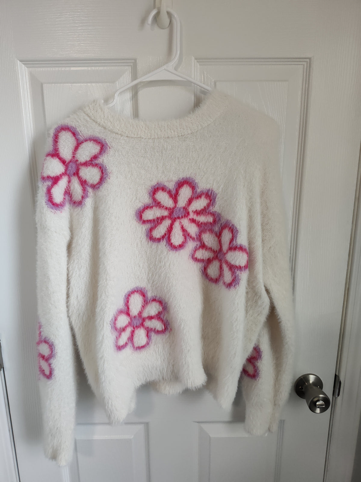 Seller 189:  Hooked Up women's flower fuzzy sweater size Medium