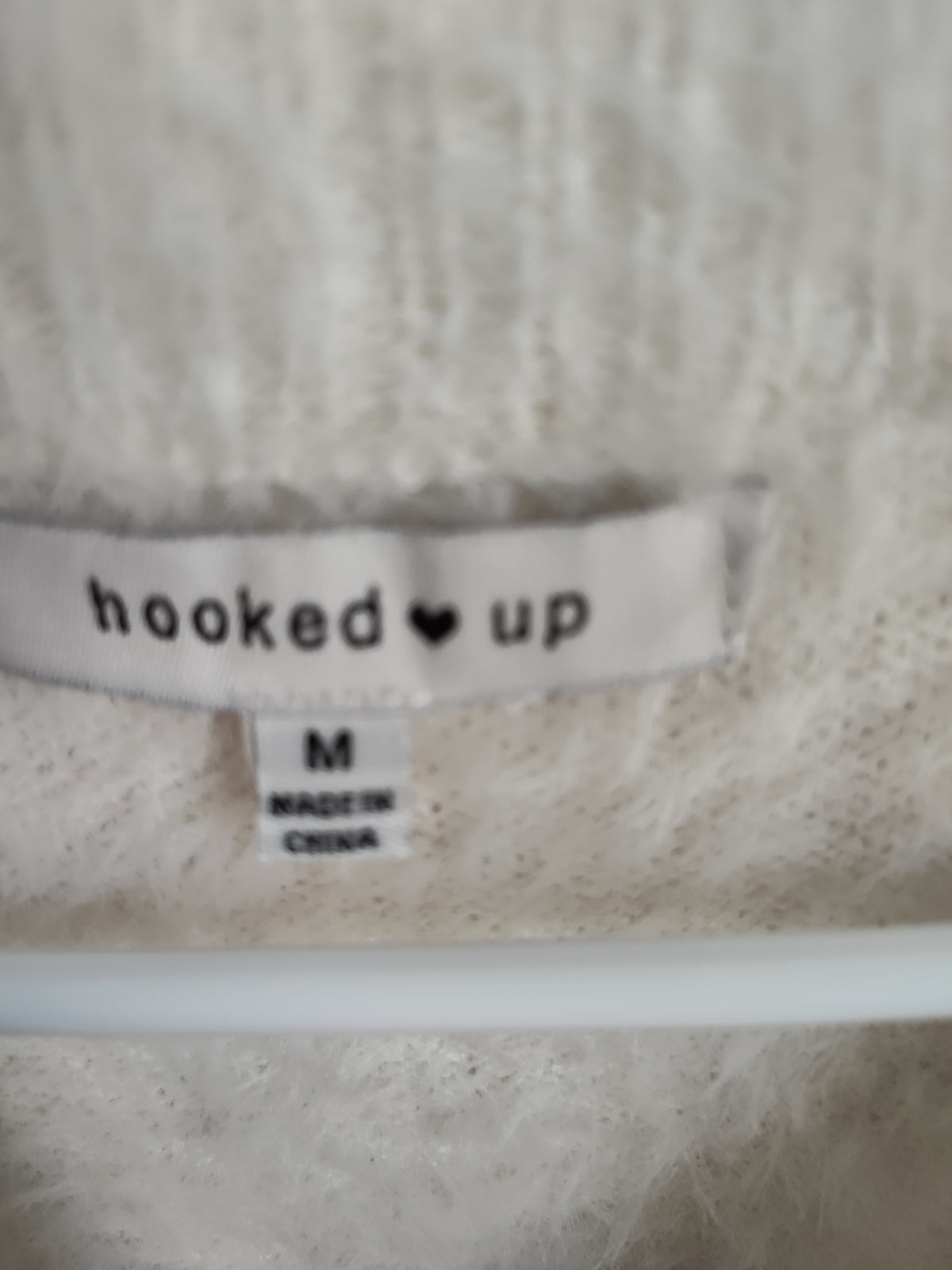 Seller 189:  Hooked Up women's flower fuzzy sweater size Medium