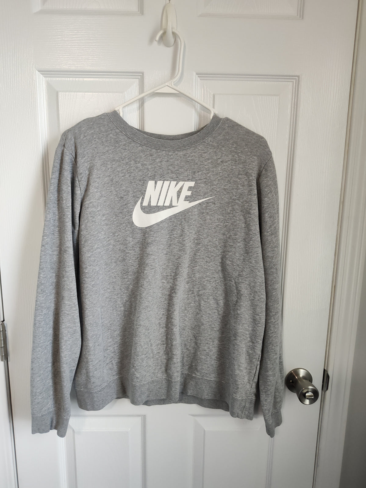Seller 189:  Nike women's gray sweatshirt size large