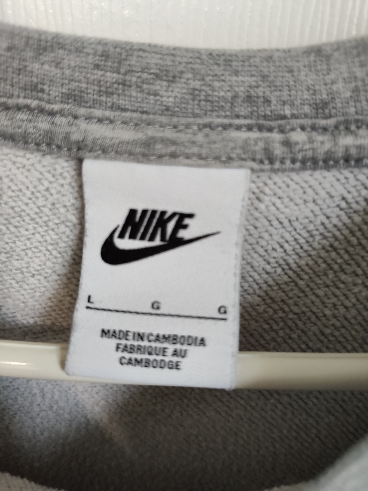 Seller 189:  Nike women's gray sweatshirt size large
